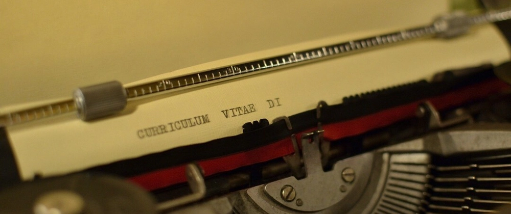 An old school typewriter typing CURRICULUM VITAE